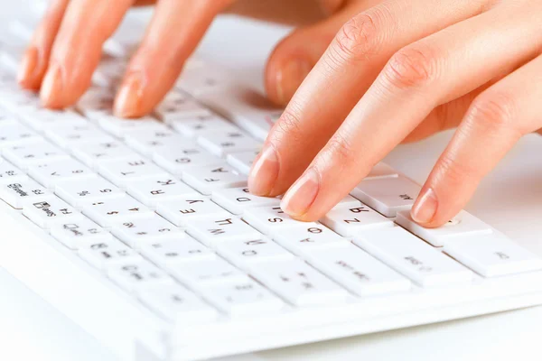 Hands typing on keyboard — Stock Photo, Image