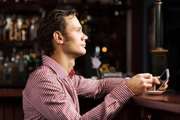 Handsome man with phone — Stock Photo, Image