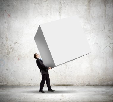 işadamı taşıyan beyaz küp