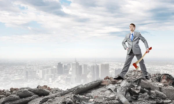 Determined businessman with axe — Stock Photo, Image