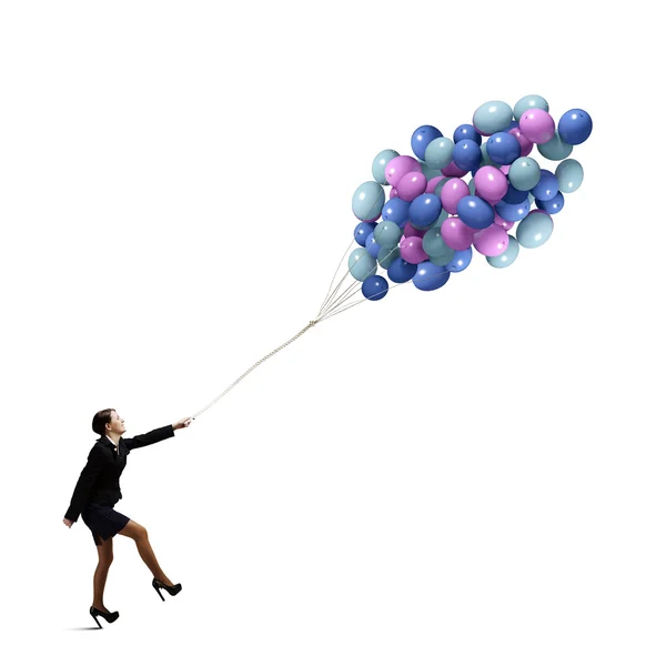 Empresária com balões coloridos — Fotografia de Stock