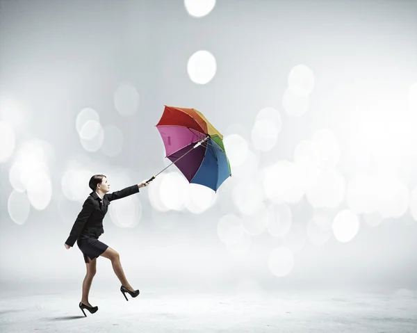 Obchodnice s deštníkem — Stock fotografie