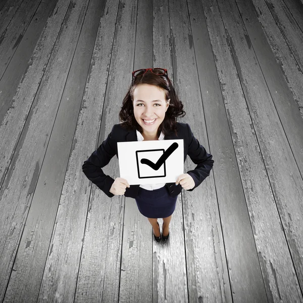 Businesswoman with banner — Stock Photo, Image