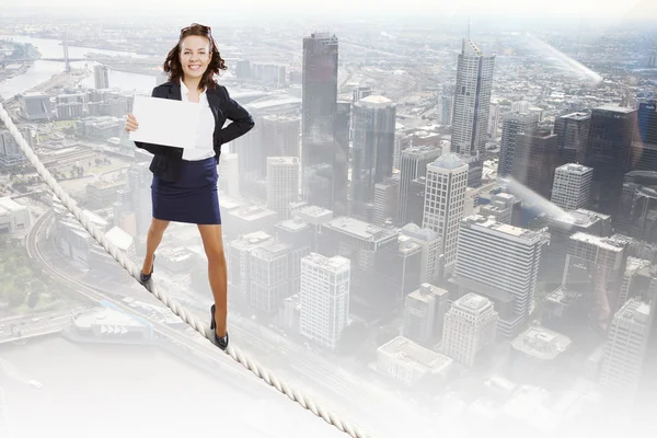 Businesswoman with banner — Stock Photo, Image