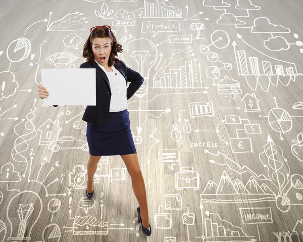 Businesswoman holding blank banner — Stock Photo, Image