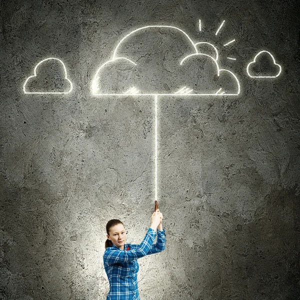 Woman holding cloud on lead — Stock Photo, Image