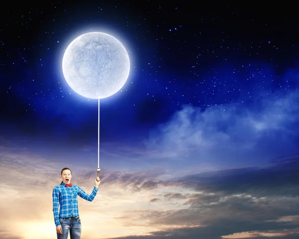 Woman holding moon on lace — Stock Photo, Image