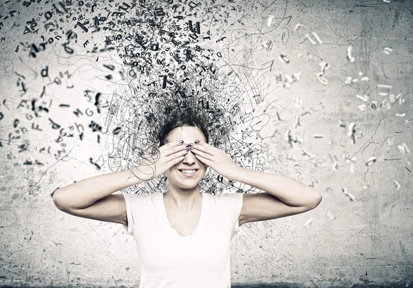 Woman hiding eyes behind palms — Stock Photo, Image