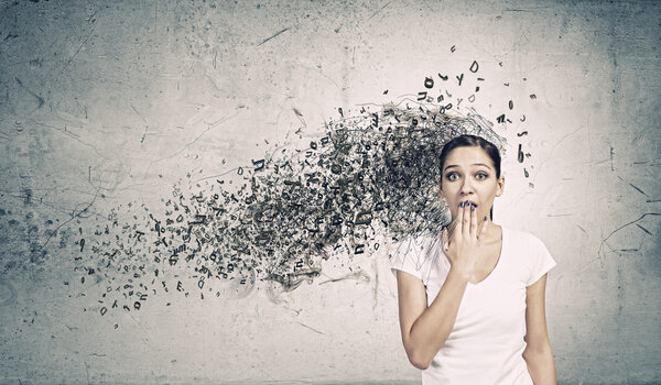 Woman closing mouth with palm