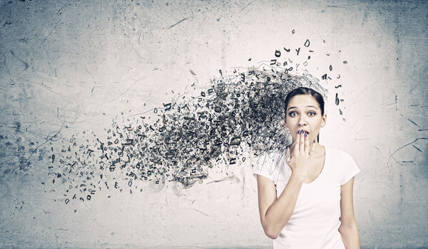 Woman closing mouth with palm