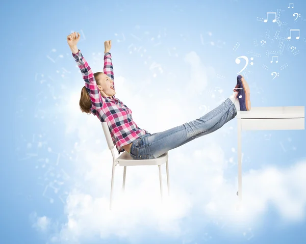 Woman sitting on cloud — Stock Photo, Image
