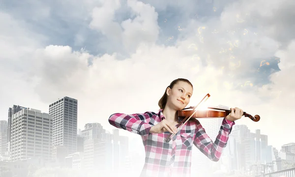 Girl playing on violin — Stock Photo, Image