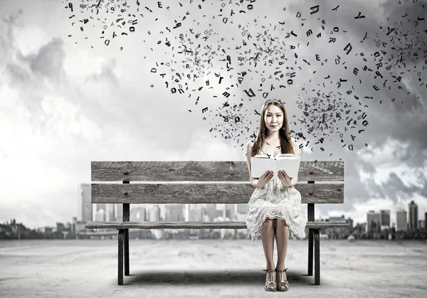 Asian woman with book — Stock Photo, Image