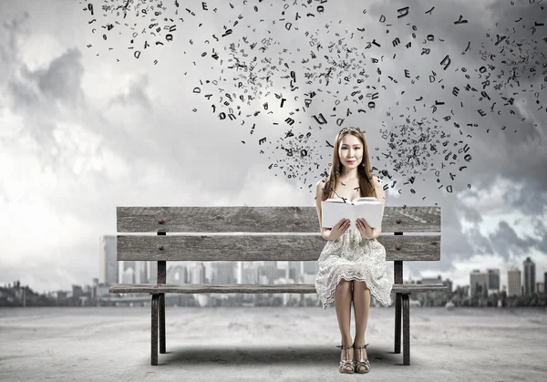 Asian woman with book — Stock Photo, Image