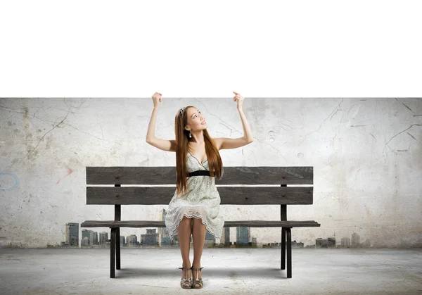 Asian woman with banner — Stock Photo, Image