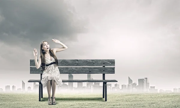 Girl on bench — Stock Photo, Image