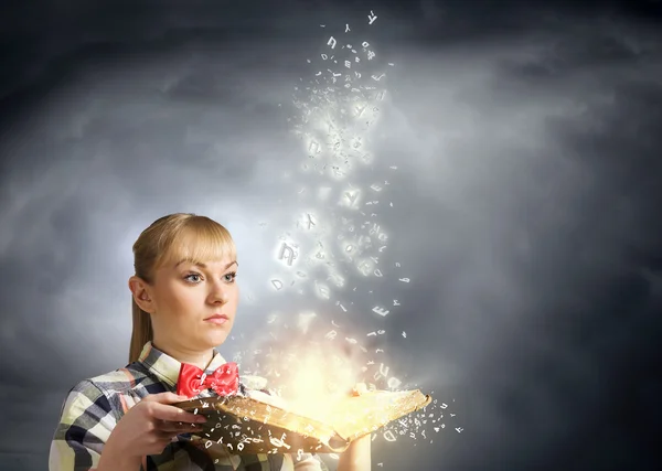 Woman holding opened book — Stock Photo, Image