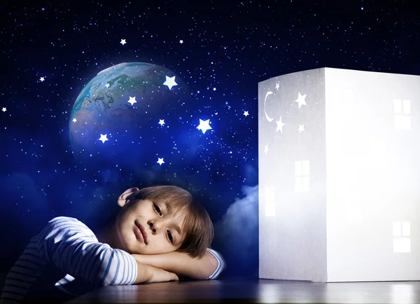 Boy dreaming about home — Stock Photo, Image