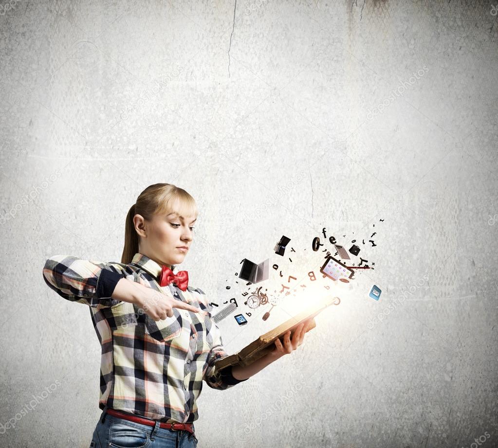 Woman holding opened book