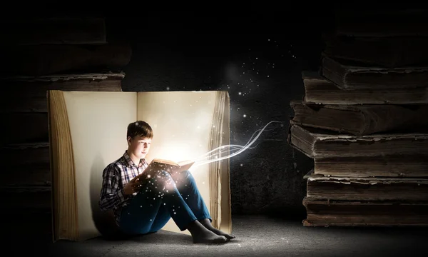 Teenager boy reading book — Stock Photo, Image