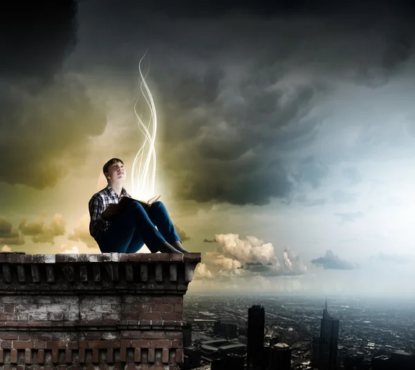 Teenager boy reading book — Stock Photo, Image