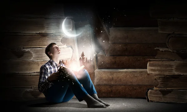 Teenager boy reading book — Stock Photo, Image