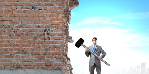 Businessman holding hammer — Stock Photo, Image