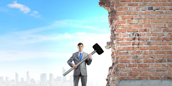 Businessman holding hammer — Stock Photo, Image