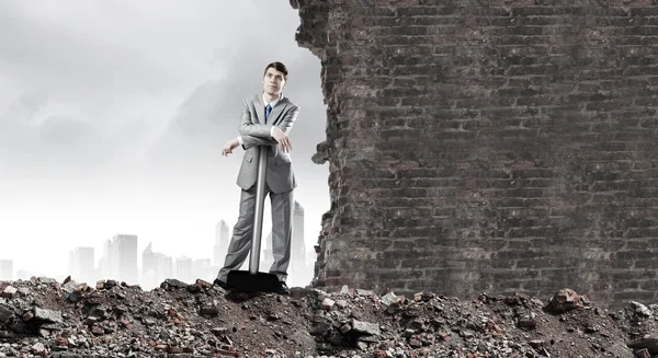 Businessman holding hammer — Stock Photo, Image