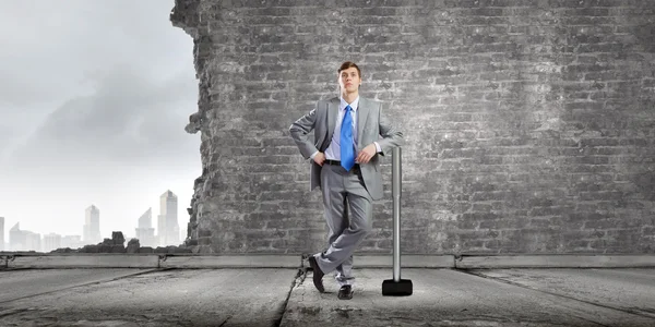 Businessman with big hammer — Stock Photo, Image