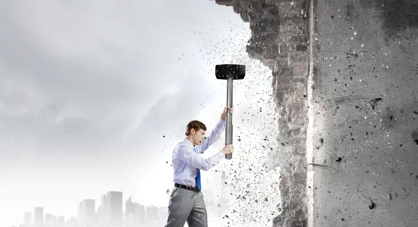 Businessman with hammer — Stock Photo, Image