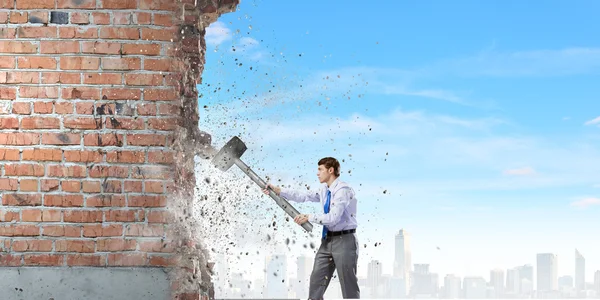 Businessman with hammer — Stock Photo, Image