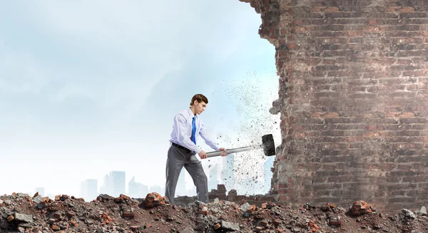 Businessman with hammer — Stock Photo, Image