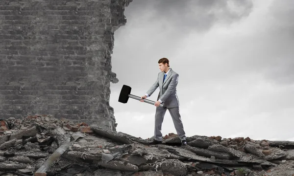 Businessman with hammer — Stock Photo, Image