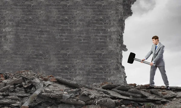 Businessman with hammer — Stock Photo, Image