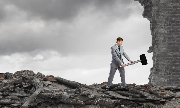 Businessman with hammer — Stock Photo, Image