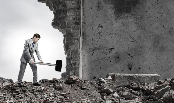 Businessman with hammer — Stock Photo, Image