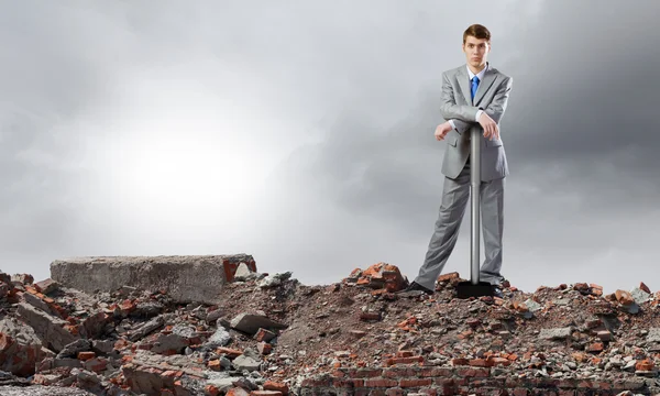 Businessman with hammer — Stock Photo, Image