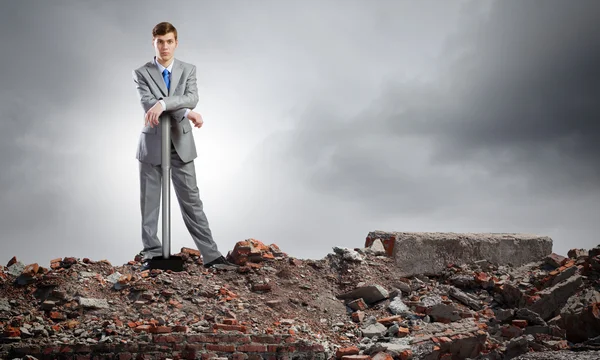 Businessman with hammer — Stock Photo, Image