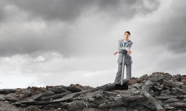 Businessman with hammer — Stock Photo, Image