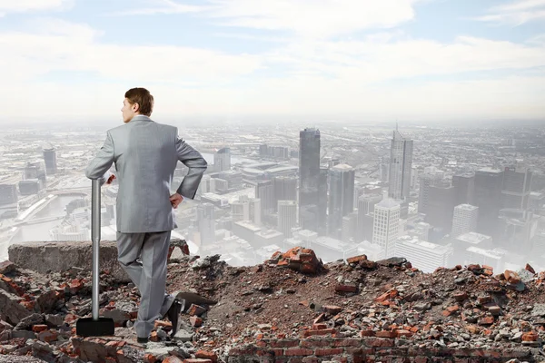 Businessman with hammer — Stock Photo, Image