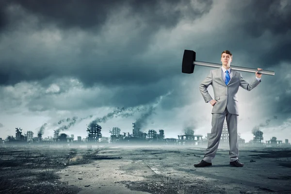 Businessman with hammer — Stock Photo, Image