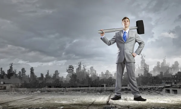 Businessman with hammer — Stock Photo, Image