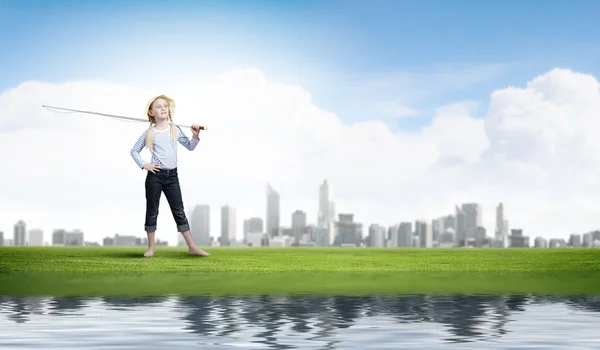 Menina com vara de pesca — Fotografia de Stock