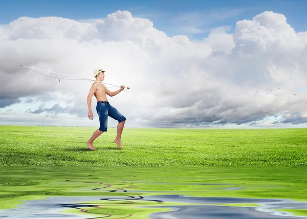 Boy with fishing rod — Stock Photo, Image