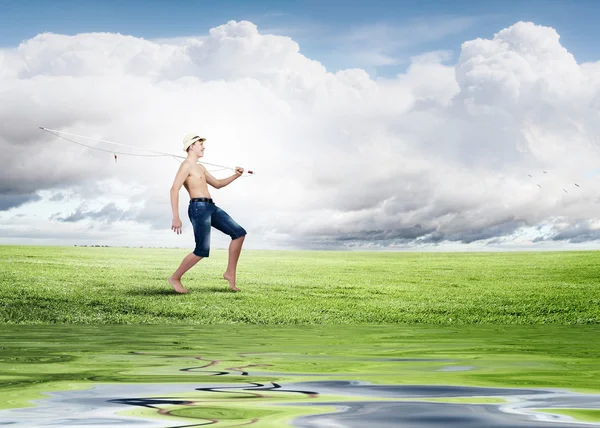 Boy with fishing rod — Stock Photo, Image