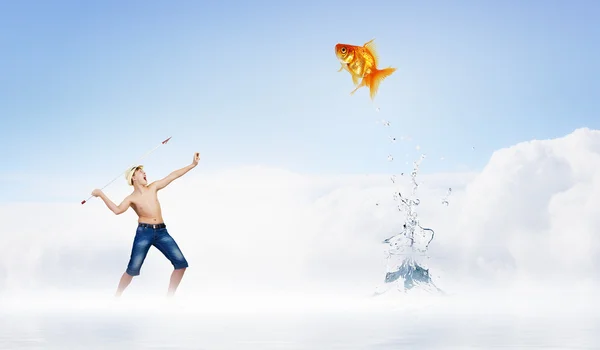 Boy hunting with harpoon — Stock Photo, Image