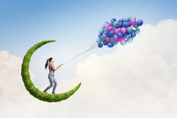 Woman with balloons — Stock Photo, Image