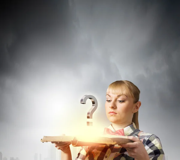 Woman holding book in hands — Stock Photo, Image