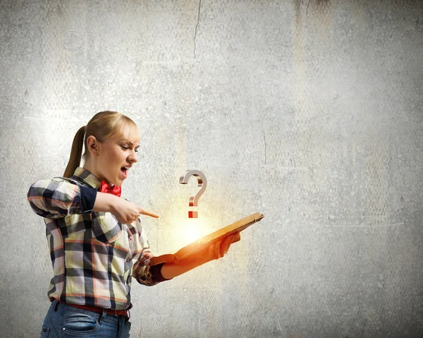 Woman holding book in hands — Stock Photo, Image